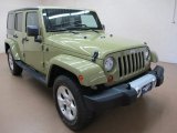 2013 Jeep Wrangler Unlimited Sahara 4x4 Front 3/4 View
