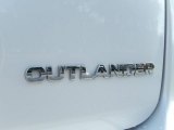 2011 Mitsubishi Outlander SE Marks and Logos
