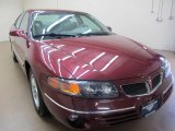 2001 Maple Red Metallic Pontiac Bonneville SE #86675951