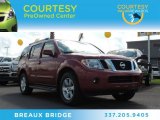 Red Brick Nissan Pathfinder in 2009