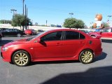 Rally Red Pearl Mitsubishi Lancer in 2009