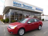 2011 Sangria Red Metallic Ford Focus SEL Sedan #87665839