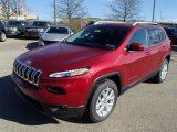 Deep Cherry Red Crystal Pearl Jeep Cherokee in 2014