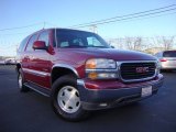 Sport Red Metallic GMC Yukon in 2004