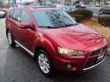 2010 Rally Red Metallic Mitsubishi Outlander SE 4WD #88532084