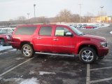 Crystal Red Tintcoat Chevrolet Suburban in 2014
