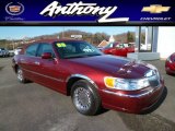Autumn Red Metallic Lincoln Town Car in 2000