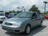 2005 Light Tundra Metallic Ford Focus ZX4 SE Sedan #8922496