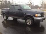 2003 Ford F150 FX4 SuperCab 4x4 Front 3/4 View