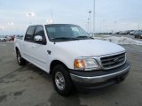 2002 Ford F150 XLT SuperCrew Front 3/4 View