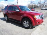 Sangria Red Metallic Ford Escape in 2009