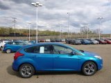 2014 Blue Candy Ford Focus SE Hatchback #93038683