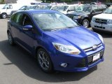 2014 Performance Blue Ford Focus SE Hatchback #93837198