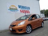 2011 Orange Revolution Metallic Honda Fit Sport Navigation #93984021