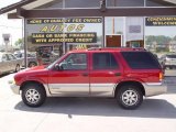 Magnetic Red Metallic GMC Jimmy in 2000