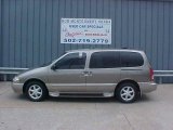 Smoked Silver Metallic Nissan Quest in 2001