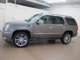 Mocha Steel Metallic Cadillac Escalade in 2011