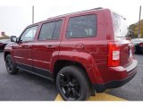 Deep Cherry Red Crystal Pearl Jeep Patriot in 2015