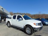 Avalanche White Nissan Frontier in 2010
