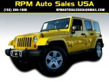 2011 Detonator Yellow Jeep Wrangler Unlimited Sahara 4x4 #99327474