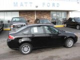2009 Ebony Black Ford Focus SE Sedan #9942304