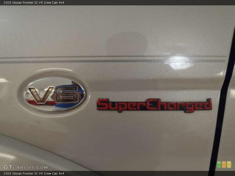 2003 Nissan Frontier Custom Badge and Logo Photo #38343041