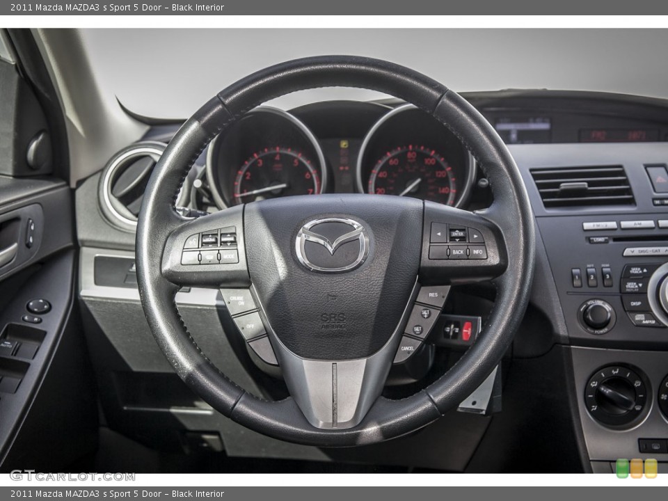 Black Interior Steering Wheel for the 2011 Mazda MAZDA3 s Sport 5 Door #100045064