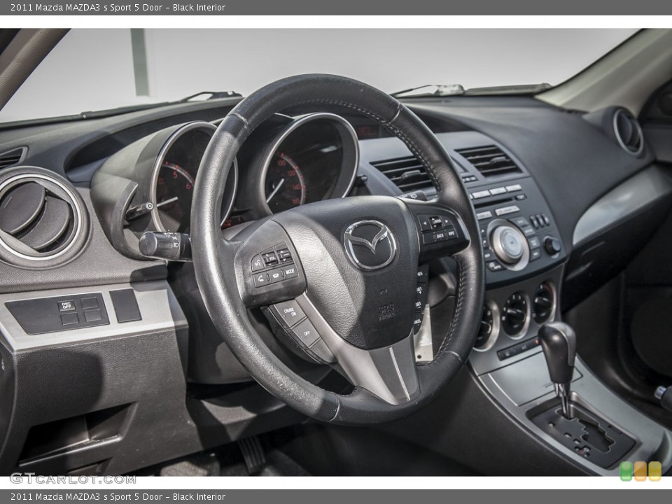 Black Interior Dashboard for the 2011 Mazda MAZDA3 s Sport 5 Door #100045172
