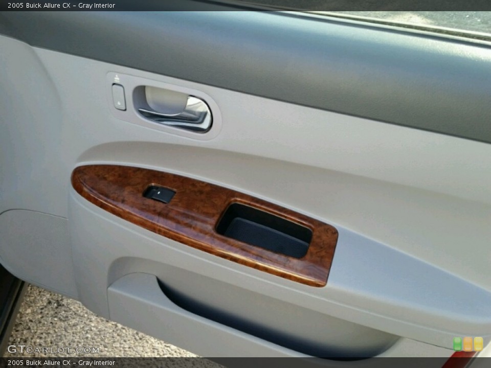 Gray Interior Door Panel for the 2005 Buick Allure CX #100093267