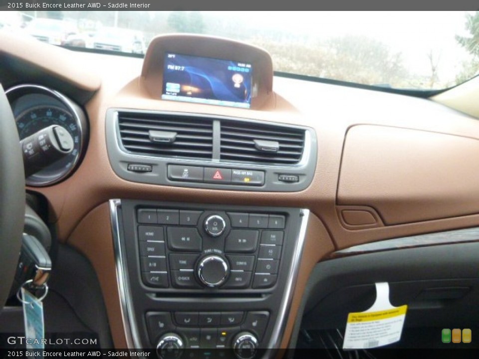Saddle Interior Dashboard for the 2015 Buick Encore Leather AWD #100139575