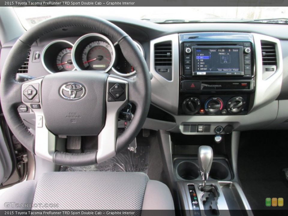 Graphite Interior Dashboard for the 2015 Toyota Tacoma PreRunner TRD Sport Double Cab #100154212