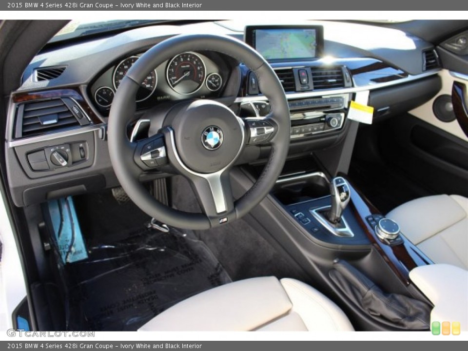 Ivory White and Black 2015 BMW 4 Series Interiors