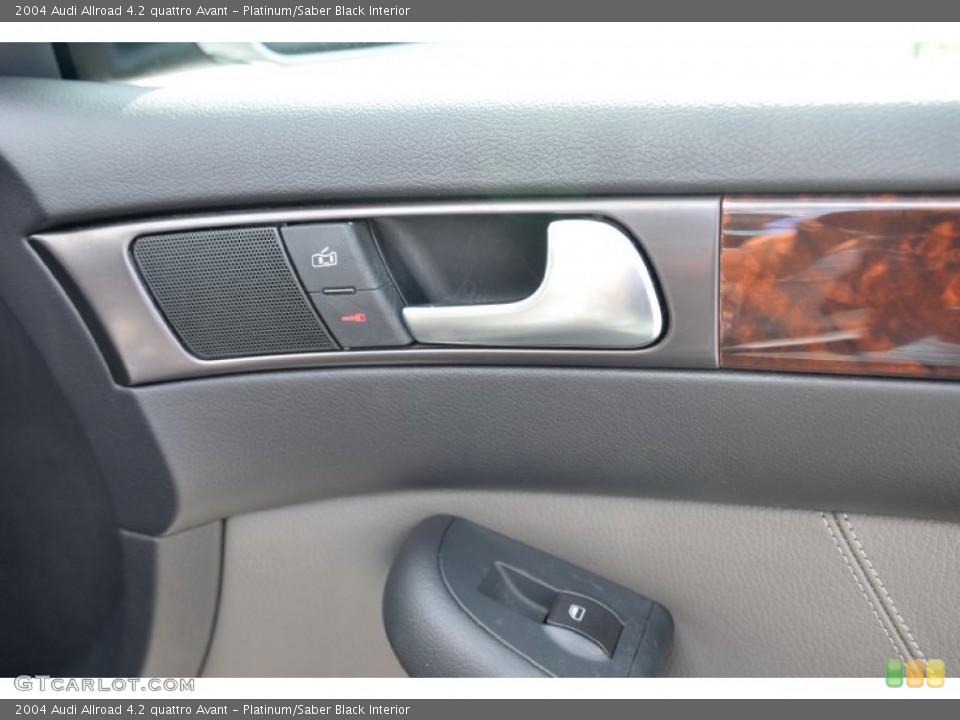 Platinum/Saber Black Interior Controls for the 2004 Audi Allroad 4.2 quattro Avant #100373373