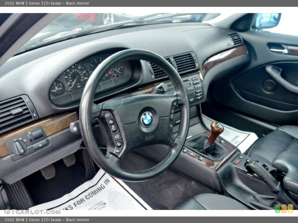 Black Interior Dashboard for the 2002 BMW 3 Series 325i Sedan #100633885
