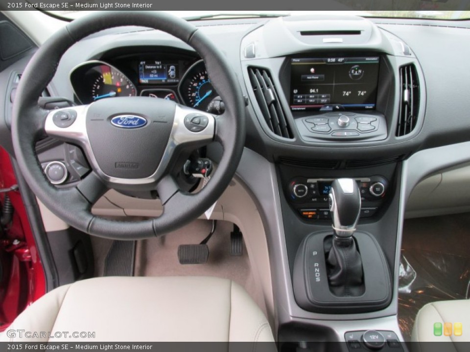 Medium Light Stone Interior Dashboard for the 2015 Ford Escape SE #100646189