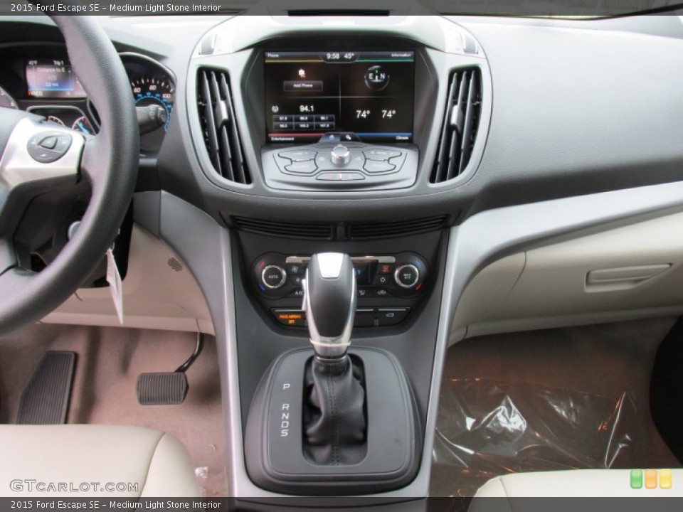 Medium Light Stone Interior Dashboard for the 2015 Ford Escape SE #100646210