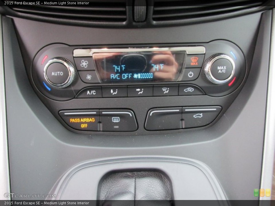 Medium Light Stone Interior Controls for the 2015 Ford Escape SE #100646273