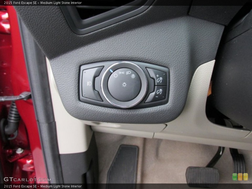 Medium Light Stone Interior Controls for the 2015 Ford Escape SE #100646387