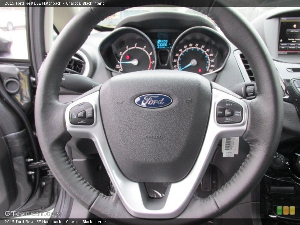 Charcoal Black Interior Steering Wheel for the 2015 Ford Fiesta SE Hatchback #100692407