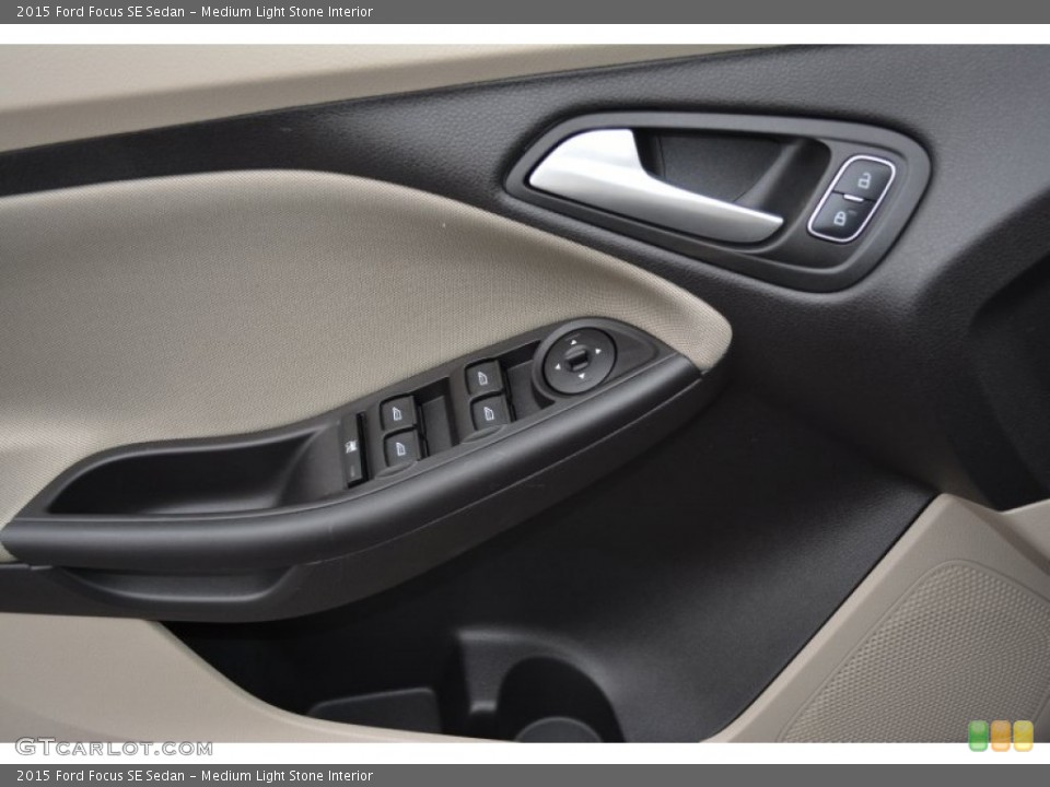 Medium Light Stone Interior Door Panel for the 2015 Ford Focus SE Sedan #100741043