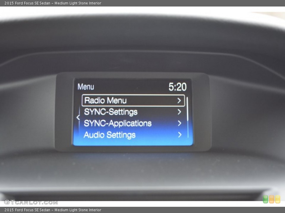 Medium Light Stone Interior Controls for the 2015 Ford Focus SE Sedan #100741196