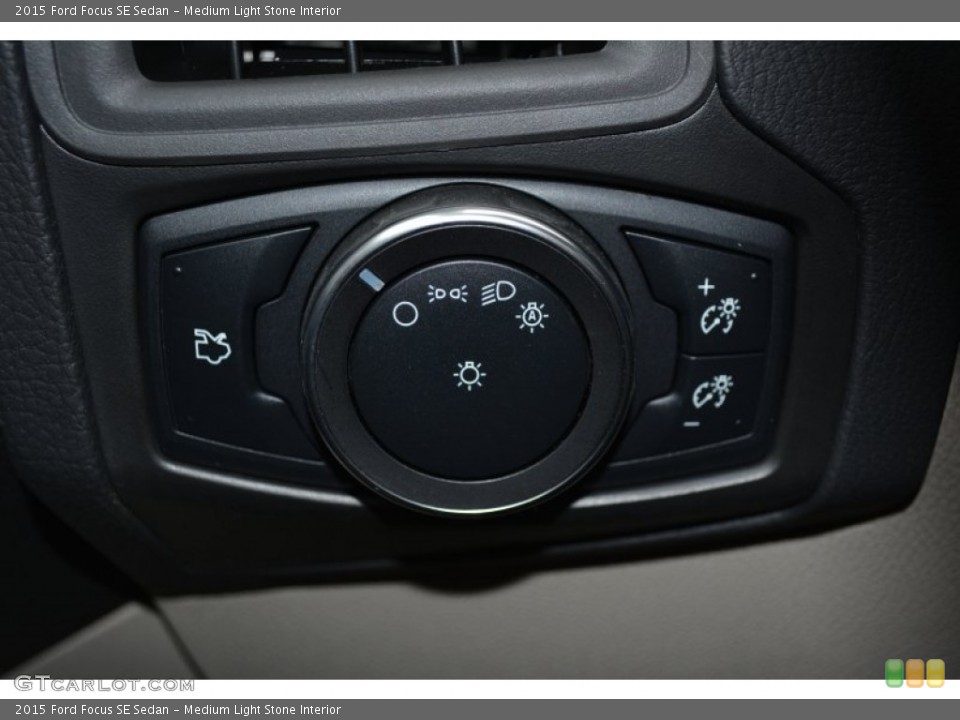 Medium Light Stone Interior Controls for the 2015 Ford Focus SE Sedan #100741286