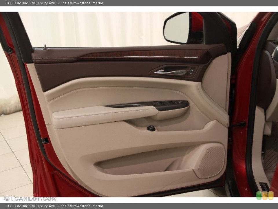 Shale/Brownstone Interior Door Panel for the 2012 Cadillac SRX Luxury AWD #101025757