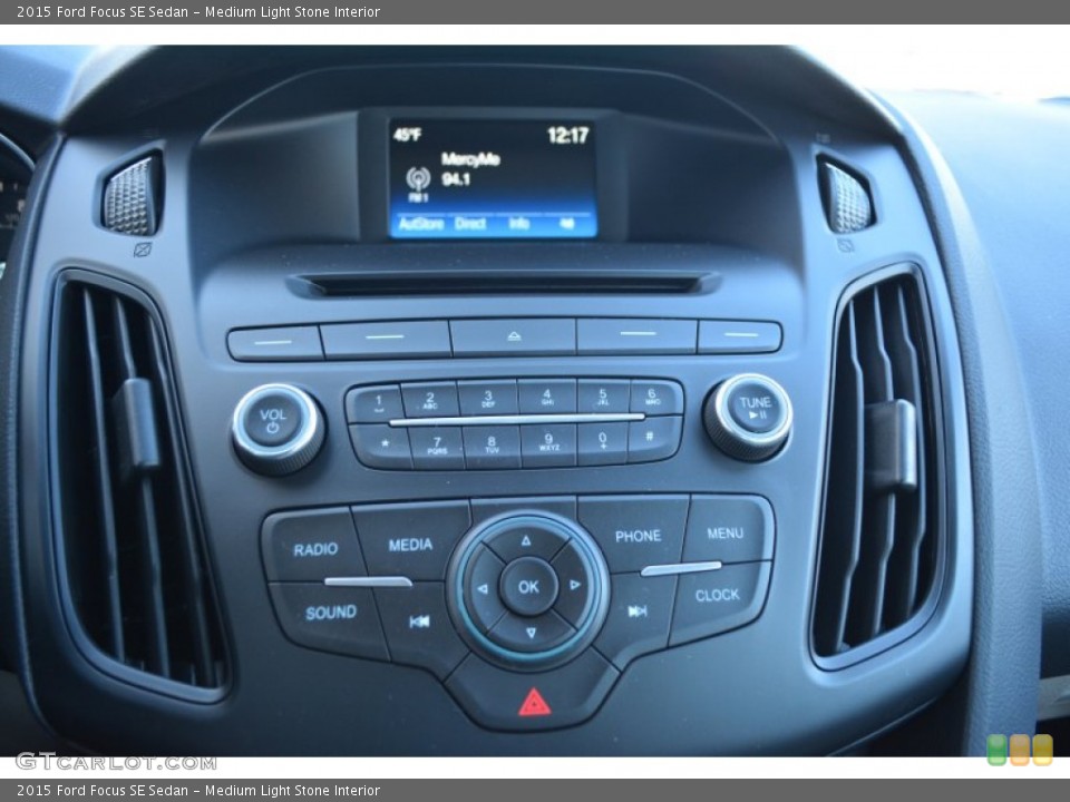 Medium Light Stone Interior Controls for the 2015 Ford Focus SE Sedan #101043611