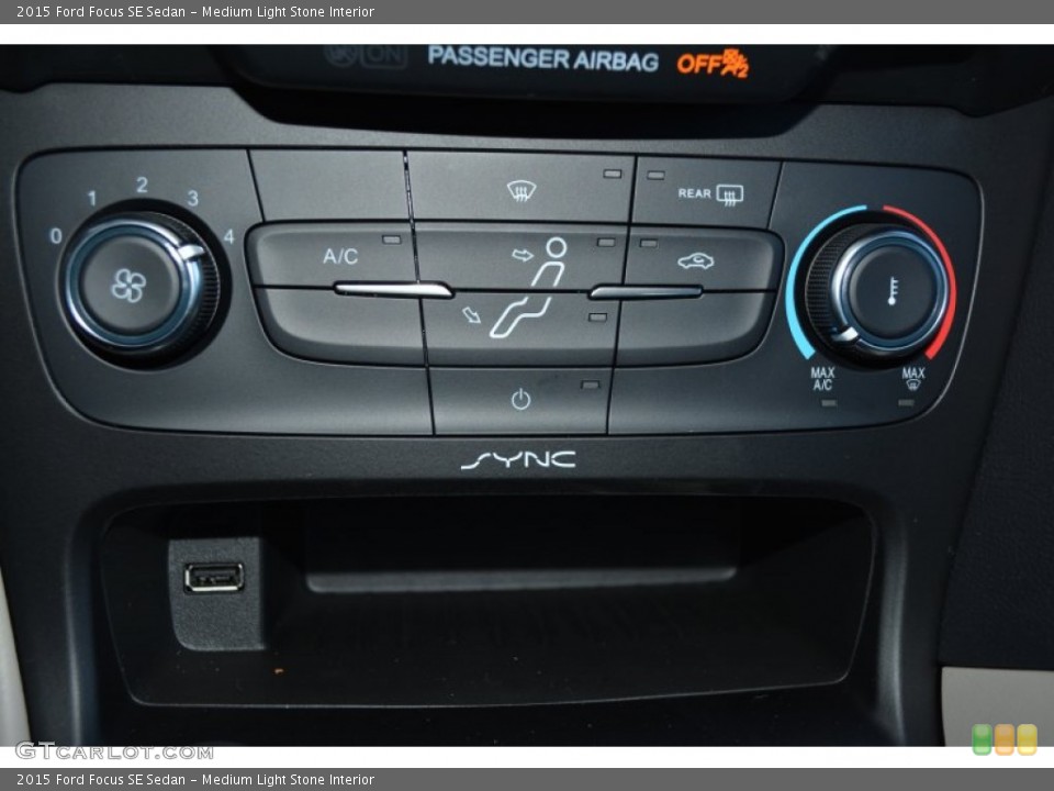 Medium Light Stone Interior Controls for the 2015 Ford Focus SE Sedan #101043655