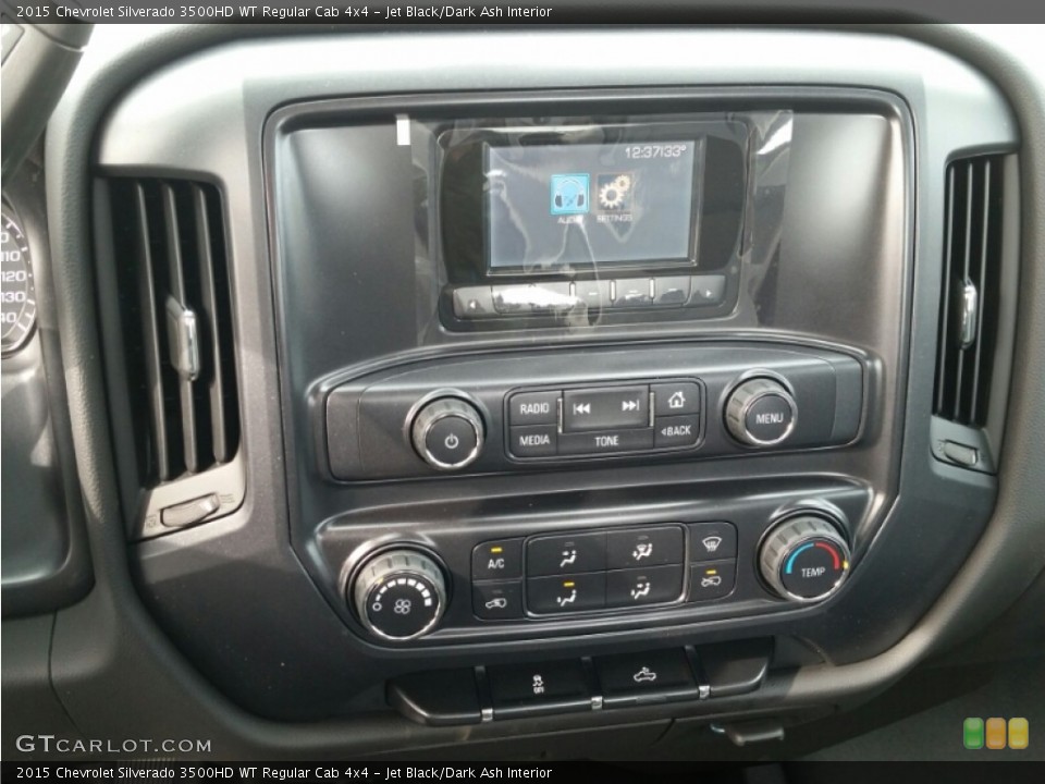 Jet Black/Dark Ash Interior Controls for the 2015 Chevrolet Silverado 3500HD WT Regular Cab 4x4 #101094753
