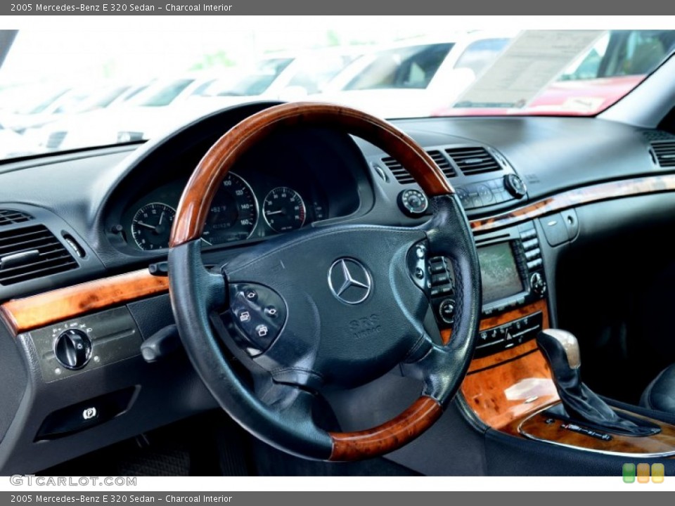 Charcoal Interior Steering Wheel for the 2005 Mercedes-Benz E 320 Sedan #101230971