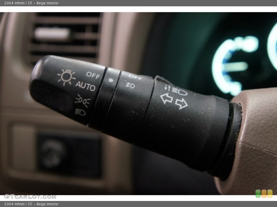Beige Interior Controls for the 2004 Infiniti I 35 #101276425