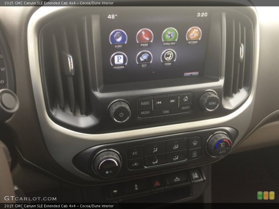 Cocoa/Dune Interior Controls for the 2015 GMC Canyon SLE Extended Cab 4x4 #101280565