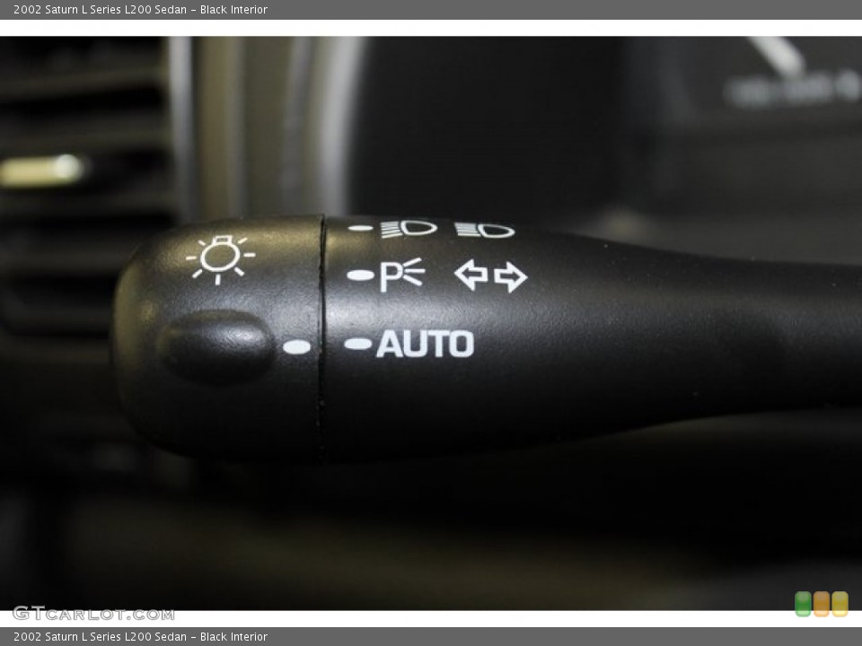 Black Interior Controls for the 2002 Saturn L Series L200 Sedan #101281410